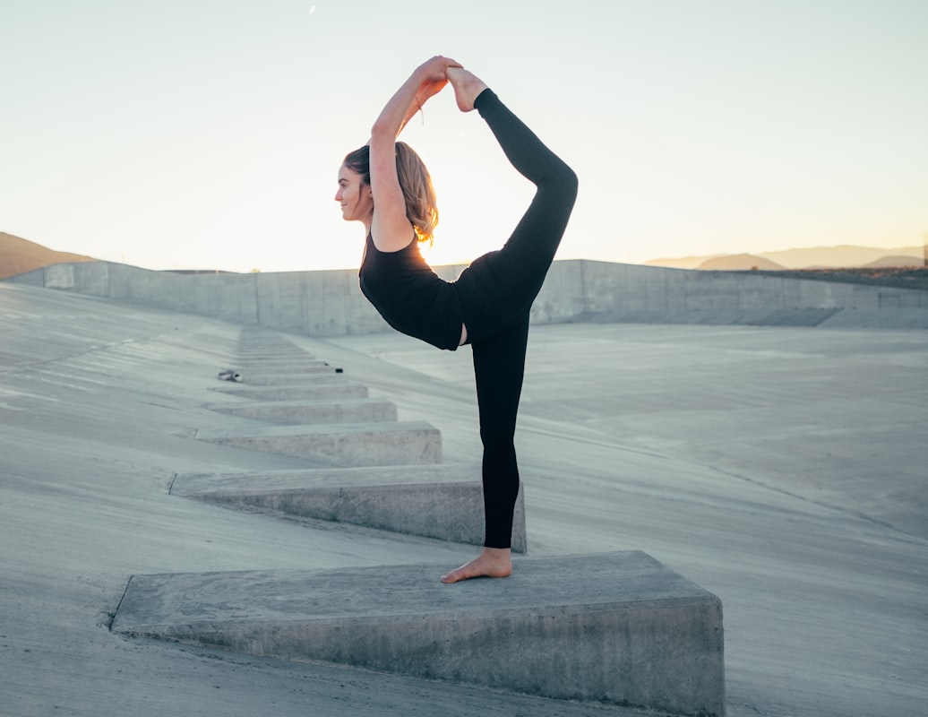 Student performing advanced stretching technique